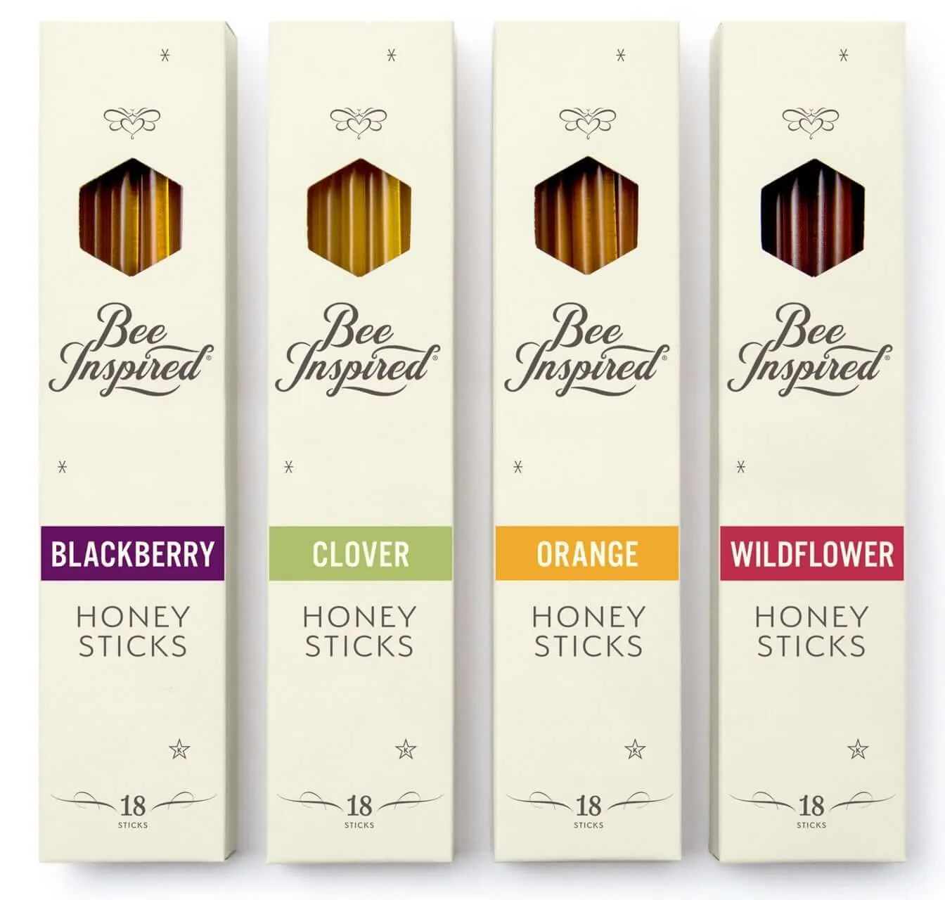 Four boxes of Bee Inspired honey sticks in Blackberry, Clover, Orange and Wildflower, each holding 18 sticks